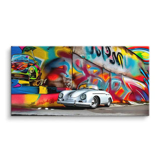 Wandbild mit weißem Porsche Cabrio vor bunter Graffiti-Wand, moderne Auto Kunst auf Leinwand