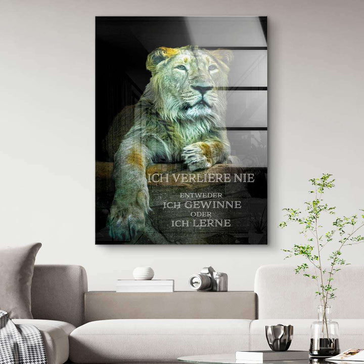 Leinwandbild mit Löwenmotiv und Motivationsspruch in modernem Wohnzimmer