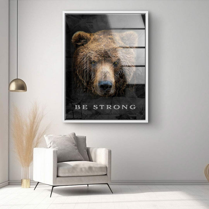 Modernes Wandbild mit Bärenkopf und Motivationsspruch Be Strong im Wohnzimmer, Kunstbild