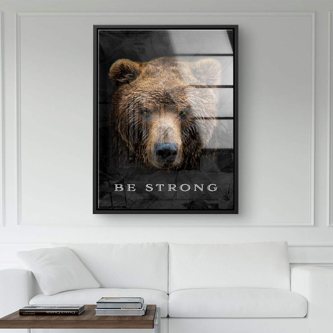 Wandbild mit Bärenkopf und Spruch Be Strong, modernes Motivationsbild im Wohnzimmer