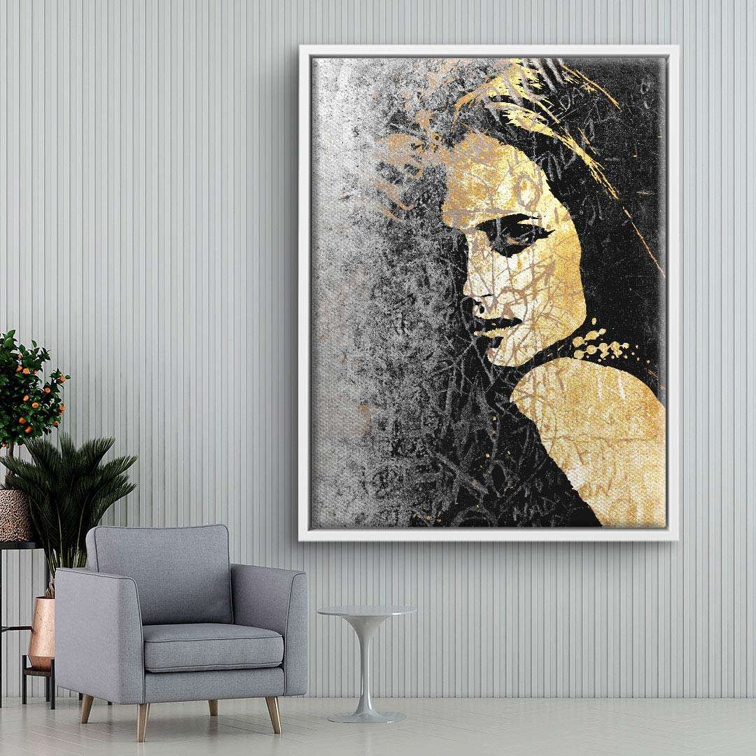 Modernes Wandbild mit goldener und schwarzer Frauen-Silhouette im Wohnzimmer