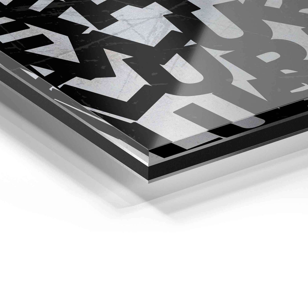 Detailaufnahme Wandbild auf Acrylglas, moderne schwarze Typografie auf transparentem Untergrund