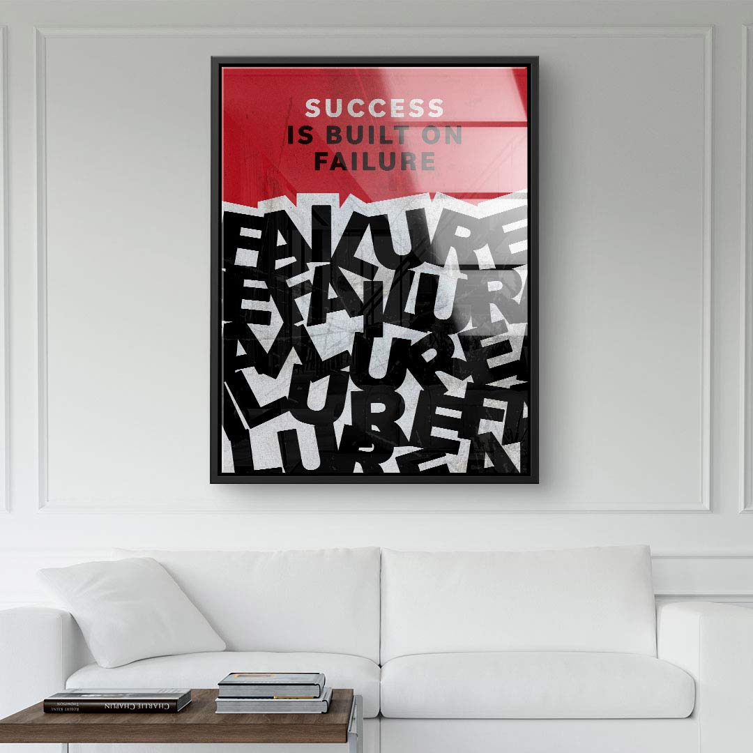 Modernes Wandbild mit Motivationsspruch 'Success is built on Failure' im Wohnzimmer