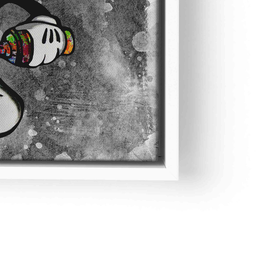 Modernes Wandbild mit Comic-Hand in Schwarz-Weiß und buntem Spray auf grauer Struktur