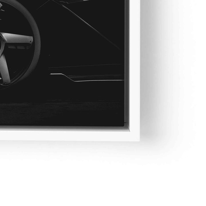 Modernes Motivationsbild mit stilisiertem Lamborghini-Rad in Schwarz-Weiß im Rahmen