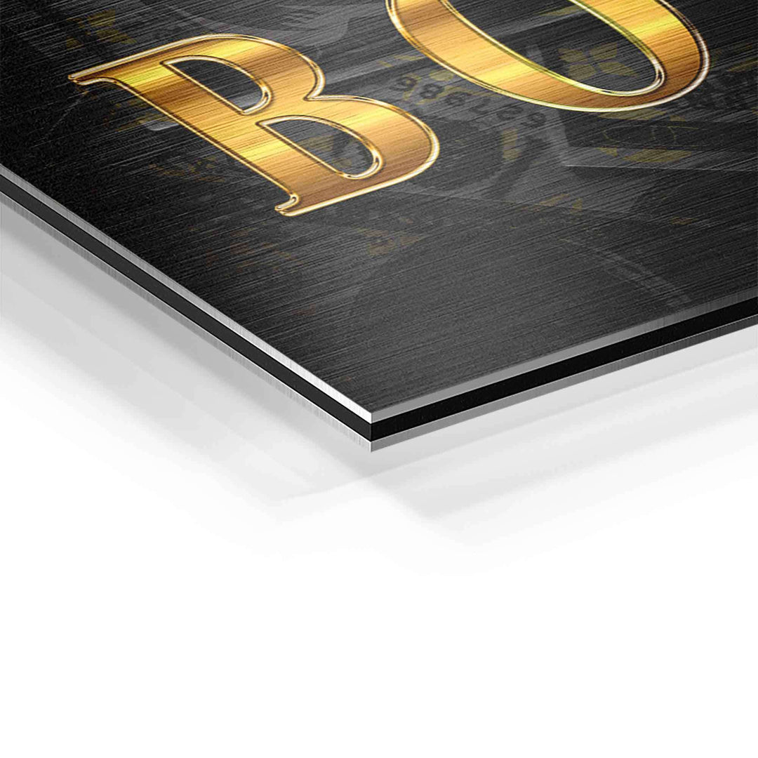 Detailaufnahme Acrylglas-Wandbild, goldene Motivationsschrift auf schwarzem Hintergrund