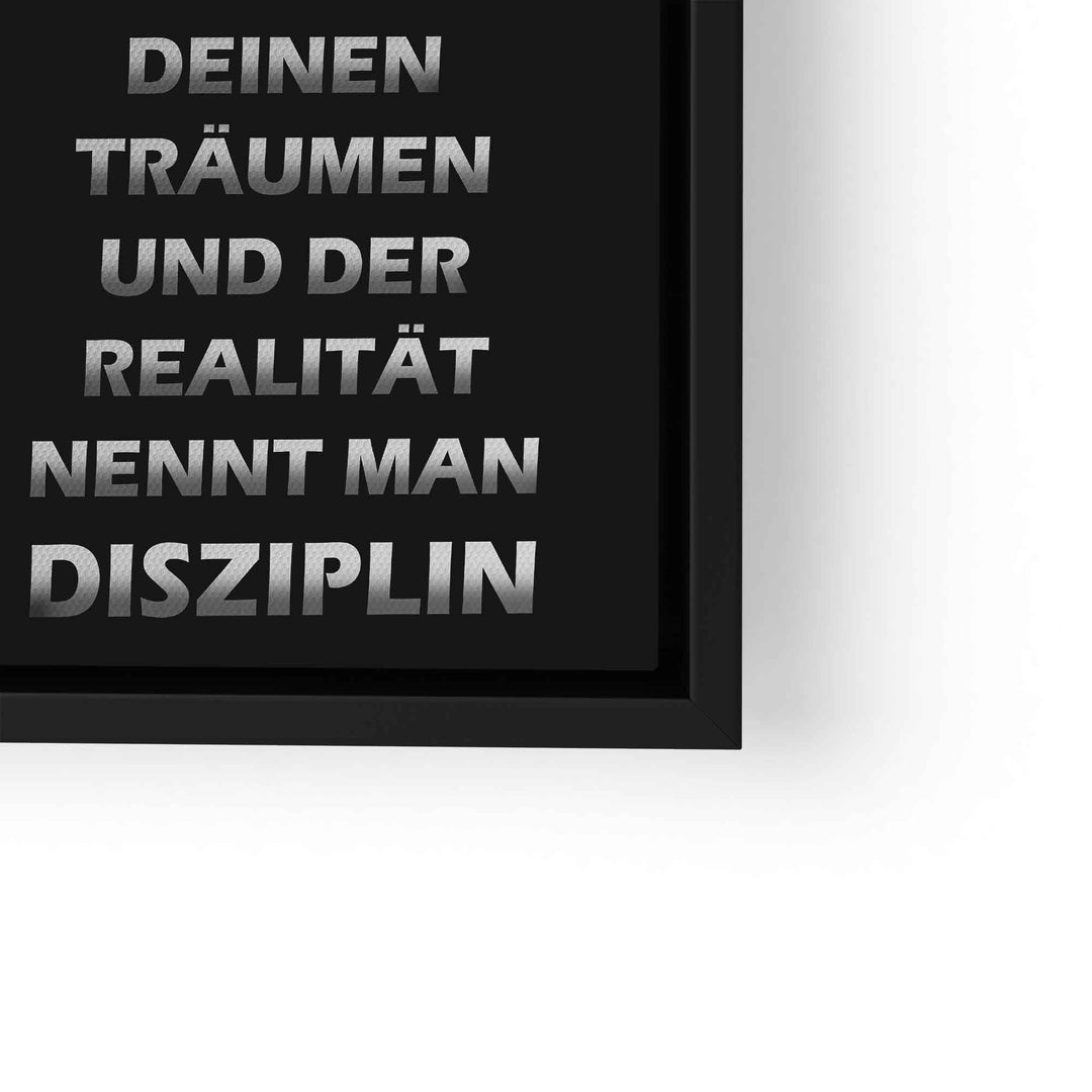 Motivationsbild mit silberner Schrift auf schwarzem Hintergrund, Spruch über Disziplin, gerahmt