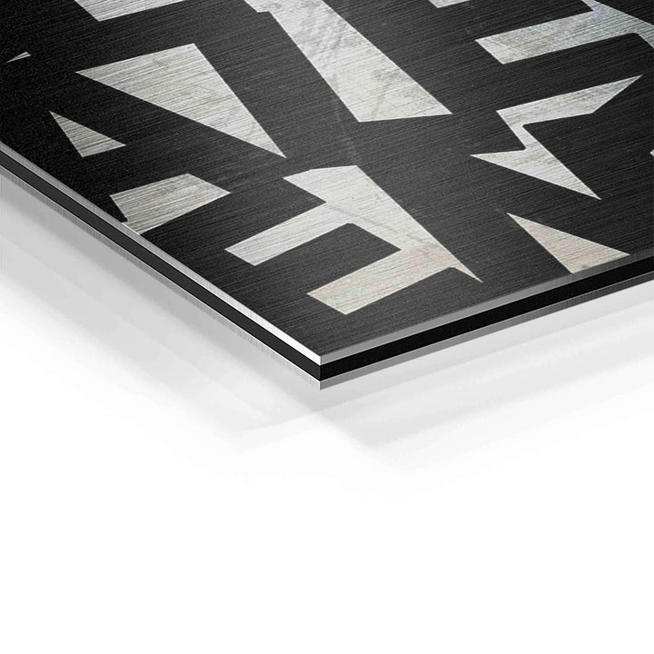 Detail eines Motivationsbilds auf Aluminium mit moderner Typografie in Schwarz und Weiß
