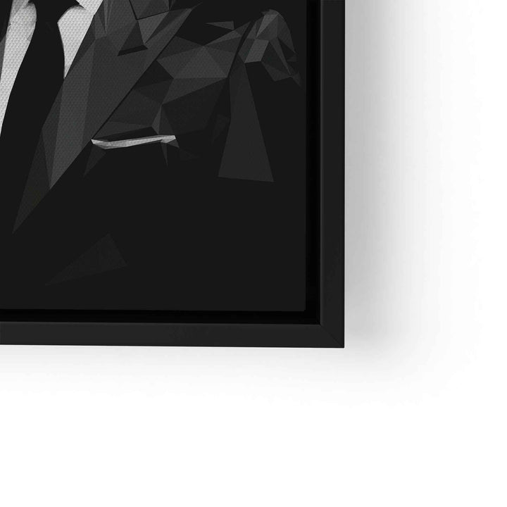 Modernes Wandbild in Schwarz-Weiß mit geometrischem Anzug-Motiv im schwarzen Rahmen.