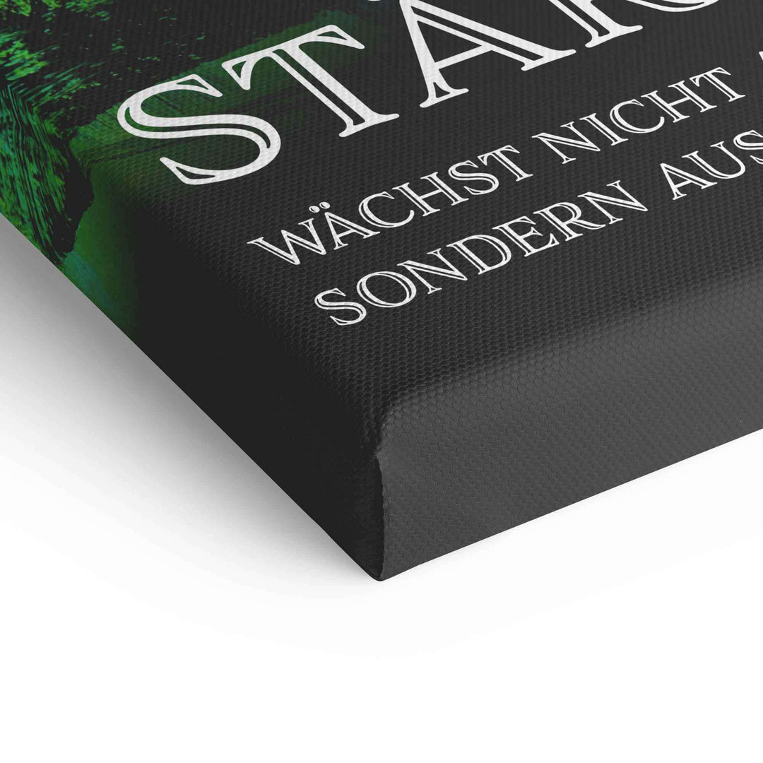 Detailansicht Motivations-Leinwandbild mit weißer Schrift und strukturiertem Rand