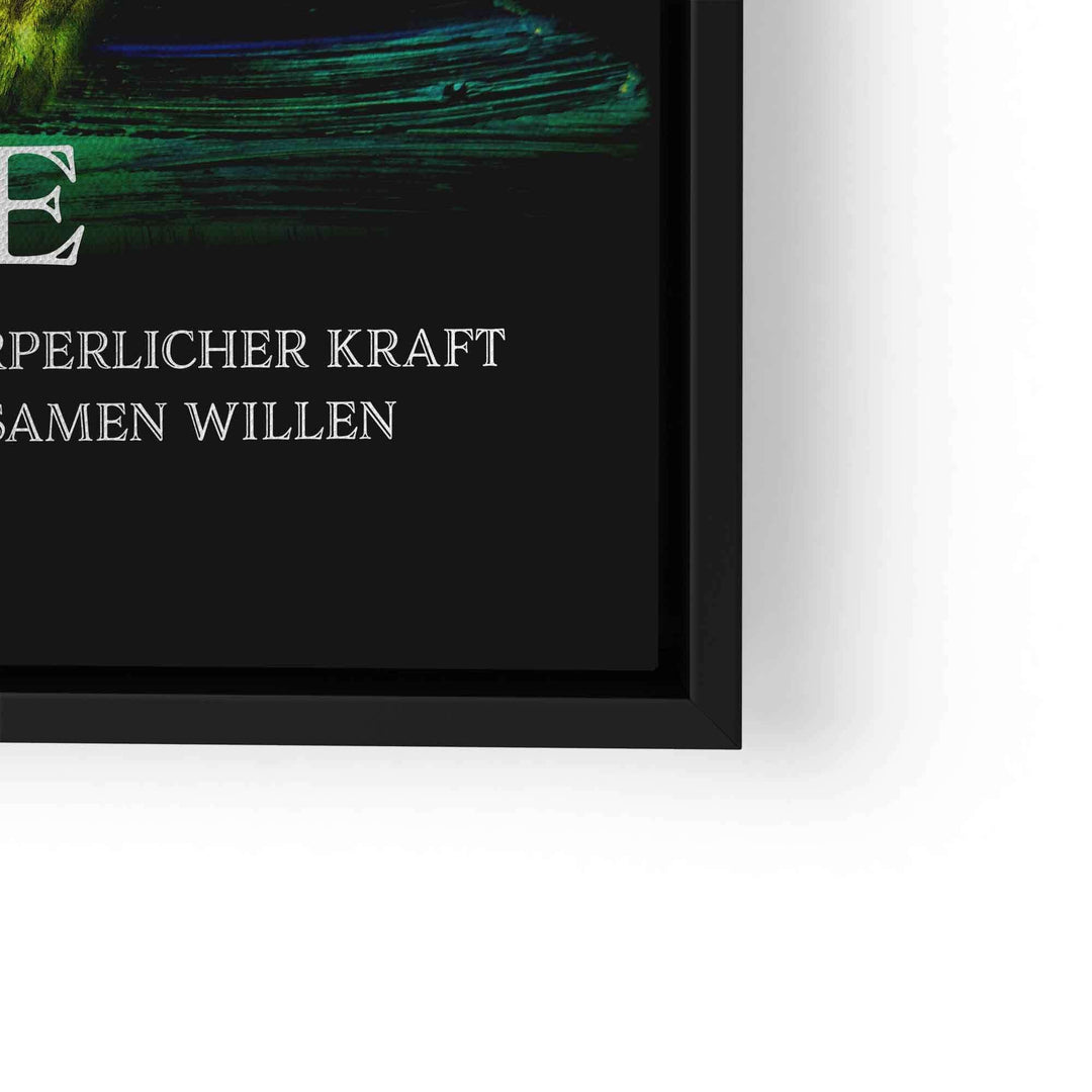 Motivationsbild mit Löwe und inspirierendem Spruch auf schwarzem Hintergrund im schwarzen Rahmen