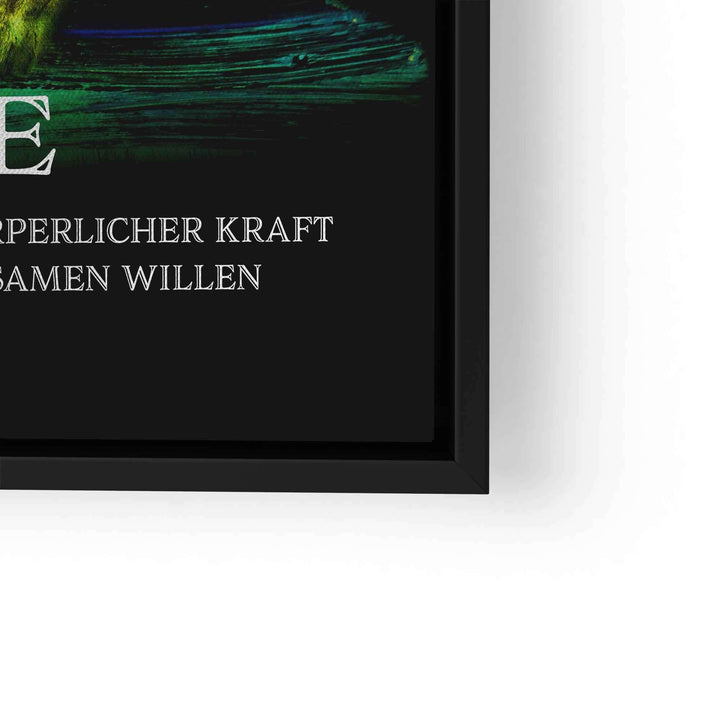 Motivationsbild mit Löwe und inspirierendem Spruch auf schwarzem Hintergrund im schwarzen Rahmen