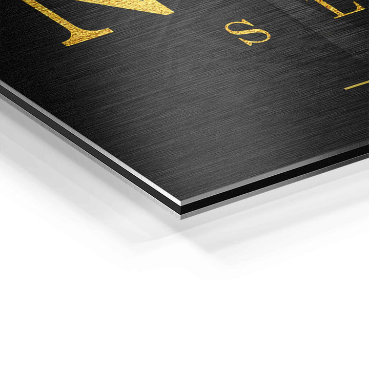 Detailaufnahme Motivationsbild auf Aluminium mit gebürsteter Oberfläche, goldene Schrift