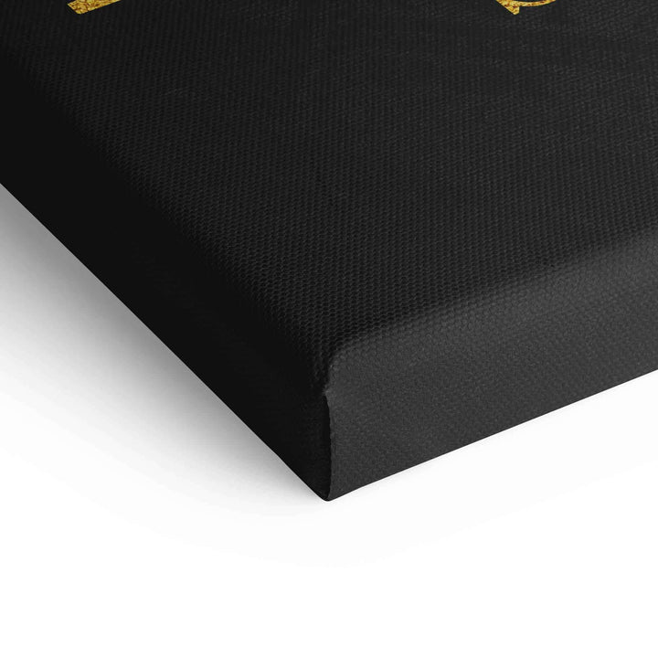 Detailansicht schwarze Leinwand mit goldener Motivationsaufschrift, Motivationsbild