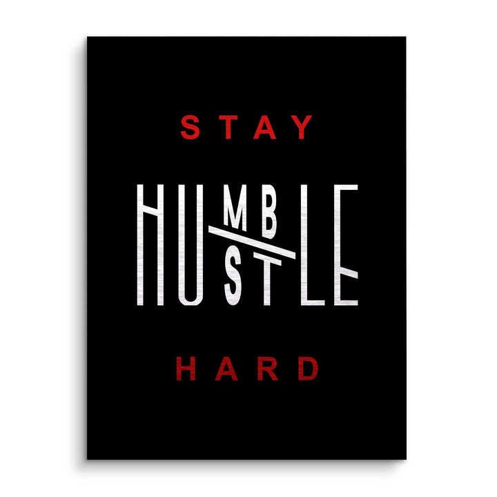 Motivationsbild auf schwarzem Hintergrund mit Schriftzug 'Stay Humble Hustle Hard' in Weiß und Rot
