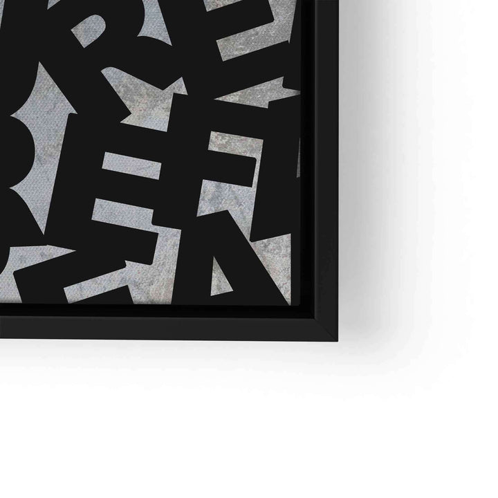 Modernes Wandbild mit abstrakten schwarzen Buchstaben auf strukturierter grauer Oberfläche