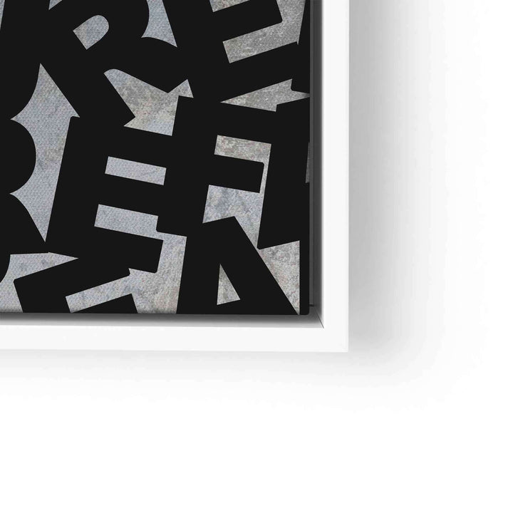 Detail eines modernen Wandbilds mit großem schwarzen Schriftzug und strukturierter grauer Oberfläche.