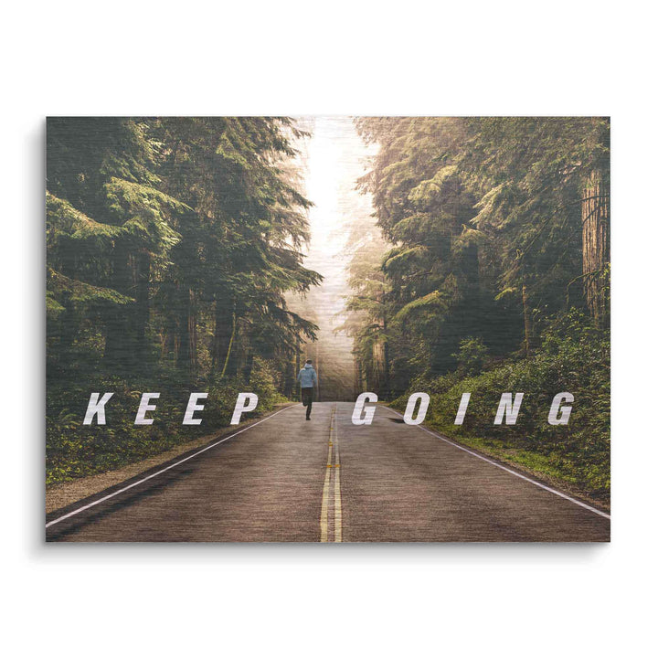 Motivationsbild mit Person auf Waldstraße und Schriftzug Keep Going, Wandbild Natur