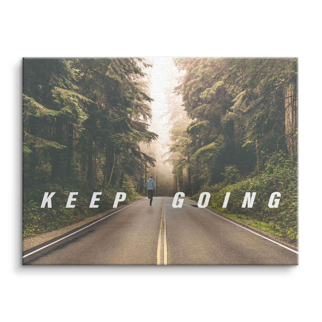 Motivationsbild Leinwand mit Waldstraße, joggender Person und Schriftzug Keep Going