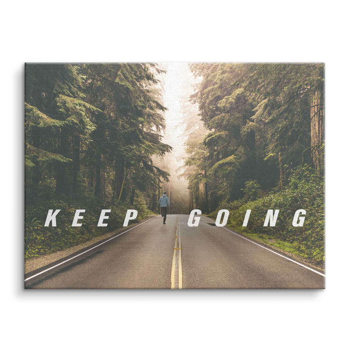 Motivationsbild Leinwand mit Waldstraße, joggender Person und Schriftzug Keep Going