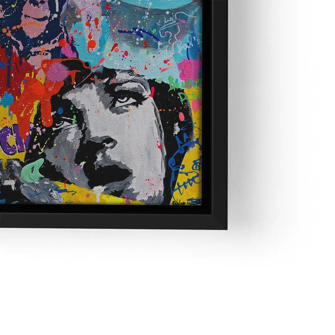 Buntes Pop Art Wandbild mit Frauengesicht, Graffiti und Farbspritzern im schwarzen Rahmen