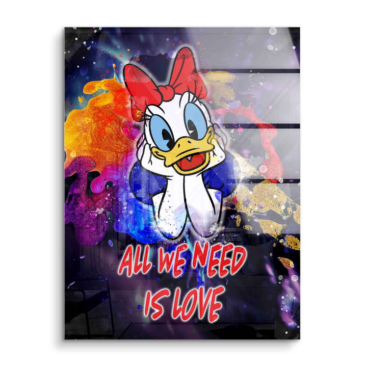Farbiges Acrylglas-Wandbild mit Comic-Ente, roter Schleife und Schriftzug 'All we need is love'.