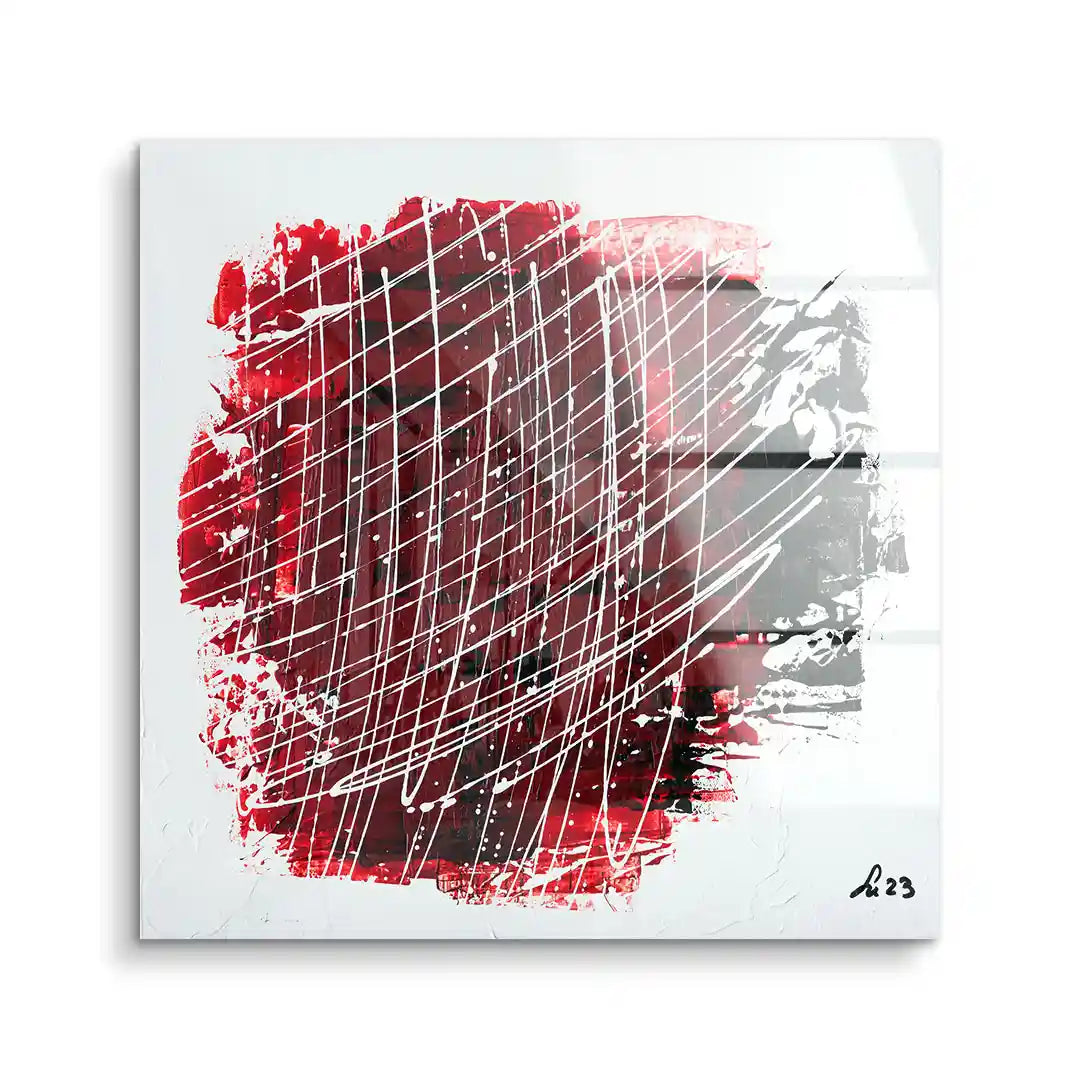 Abstraktes Wandbild auf Acrylglas mit roten, weißen und schwarzen Farbakzenten