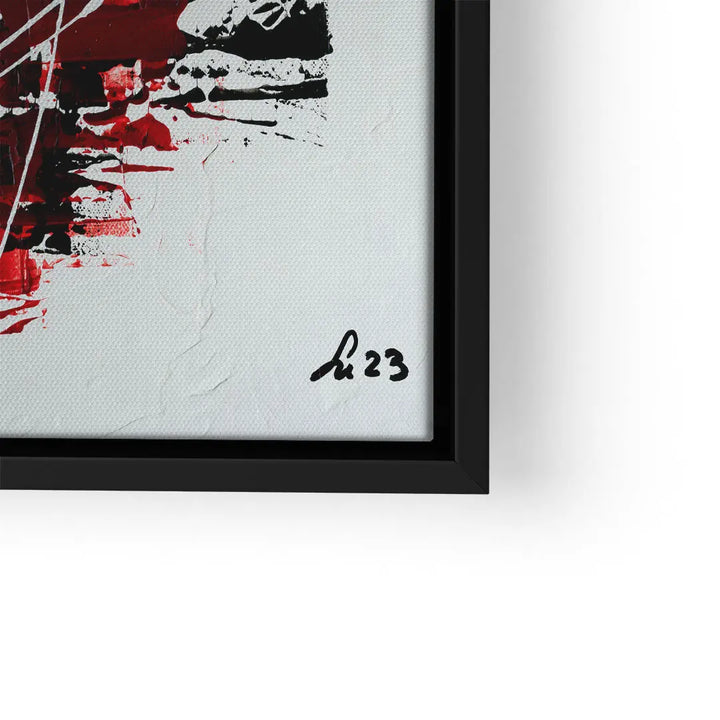 Modernes abstraktes Wandbild in Rot, Schwarz und Weiß mit Signatur, im schwarzen Rahmen