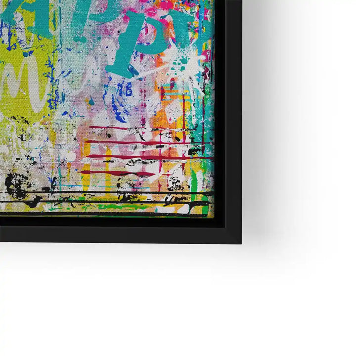 Modernes abstraktes Wandbild mit bunten Graffiti-Elementen in schwarzem Rahmen.