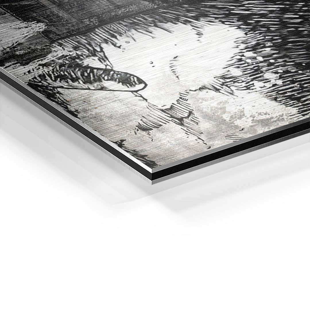 Detailaufnahme eines modernen Schwarz-Weiß-Wandbilds auf gebürstetem Aluminium