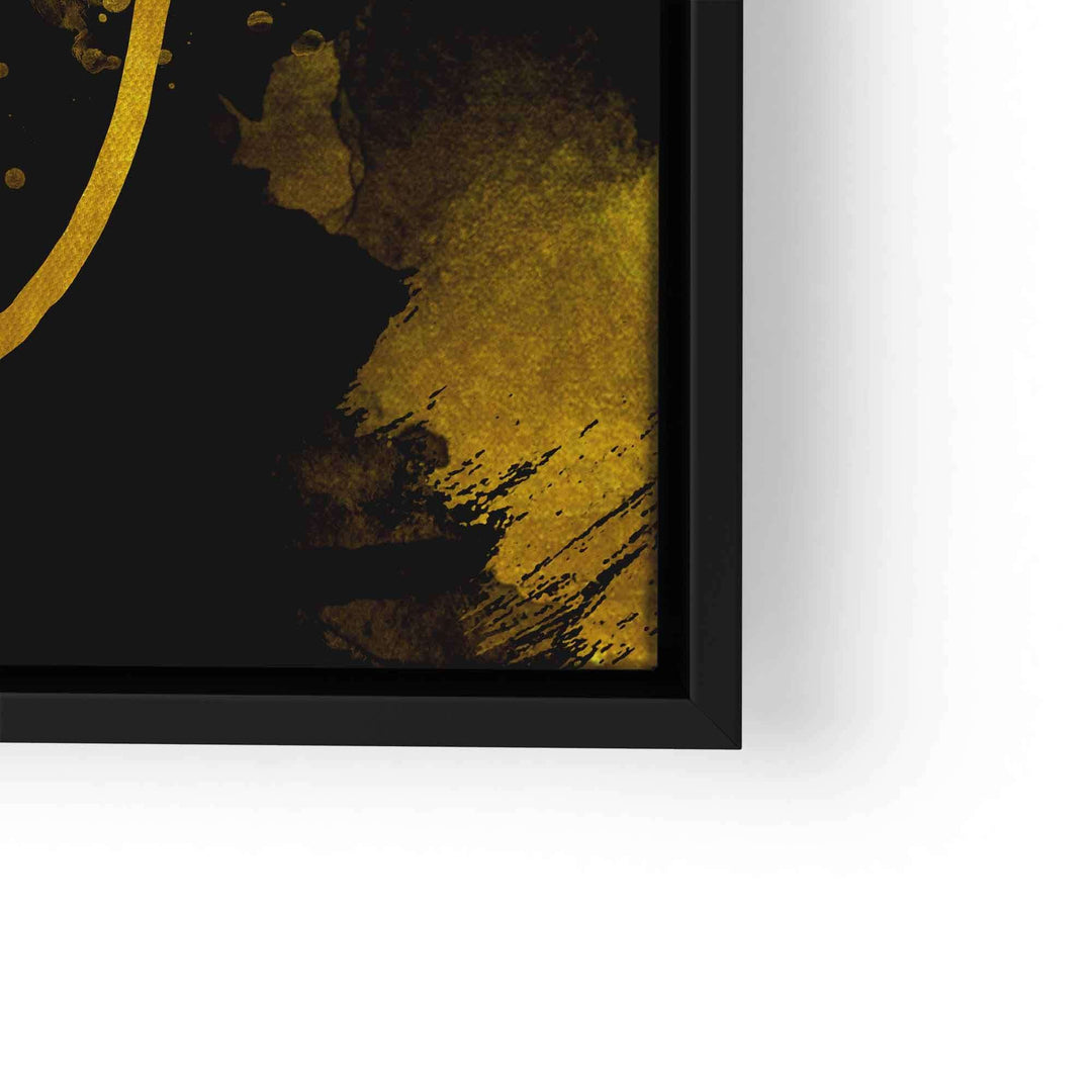 Modernes Wandbild mit abstrakten goldenen und schwarzen Farbakzenten im schwarzen Rahmen