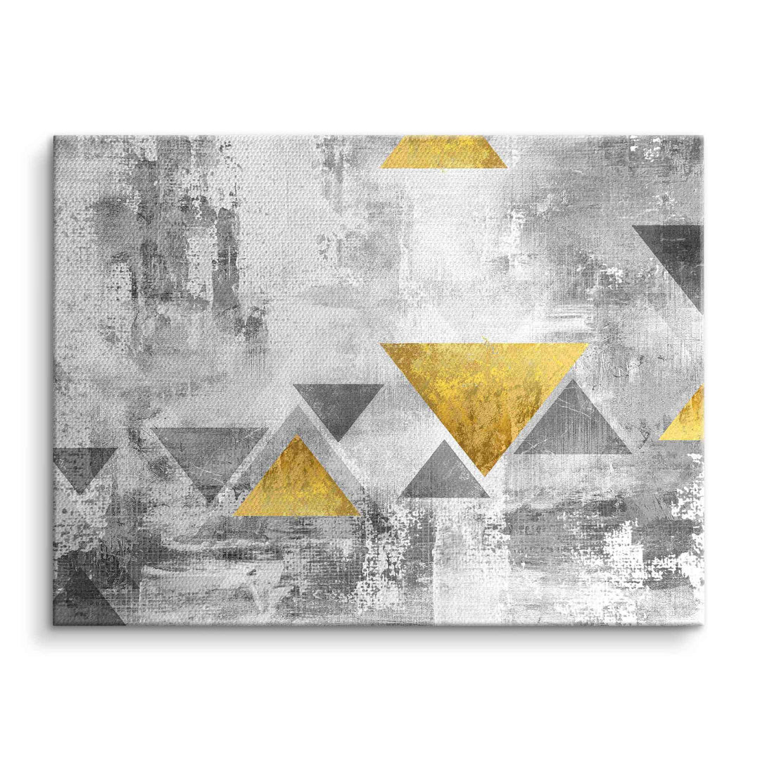 Abstraktes Wandbild mit goldenen und grauen Dreiecken auf weiß-grauem Hintergrund, Leinwand