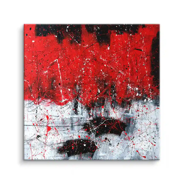 Abstraktes Wandbild in Rot, Schwarz und Weiß mit dynamischem Farbverlauf und Spritztechnik