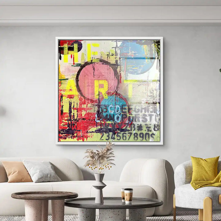 Modernes Wandbild mit buntem Herz-Motiv, abstrakter Kunst und Text im Wohnzimmer