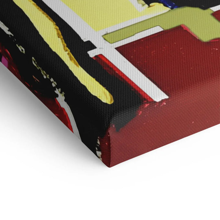 Detailaufnahme eines bunten, modernen Wandbilds auf Leinwand mit abstrakten Formen und kräftigen Farben