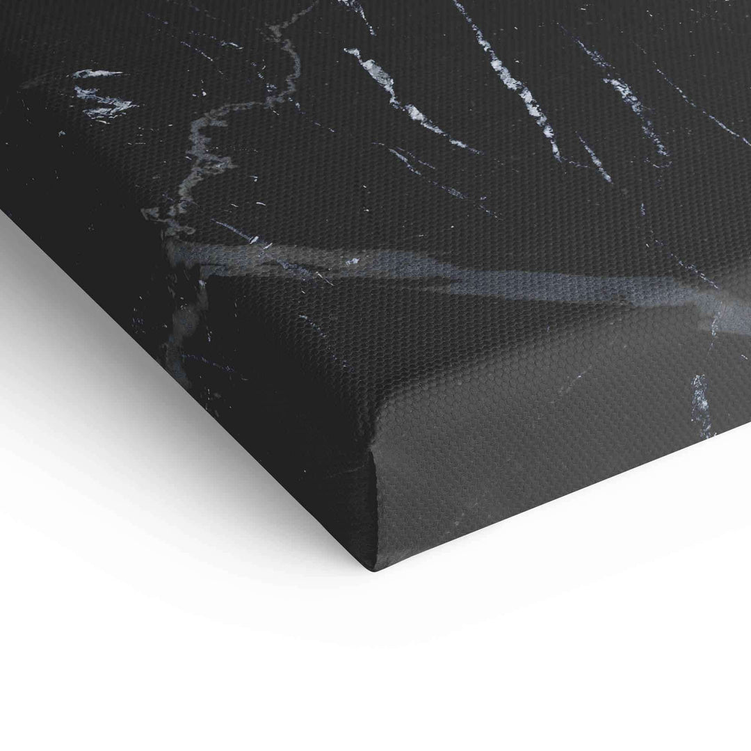 Detailansicht schwarze Leinwand mit dezentem Marmor-Muster, moderne Wandbild-Oberfläche