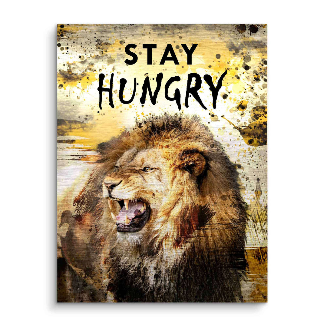 Motivationsbild mit brüllendem Löwen und Spruch Stay Hungry im künstlerischen Design