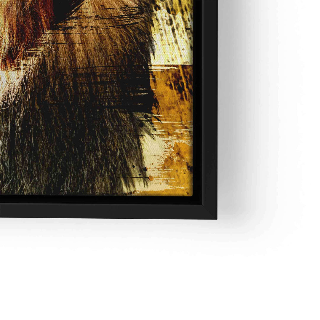 Detail eines modernen Löwen Wandbilds mit abstraktem gelbem Hintergrund im schwarzen Rahmen