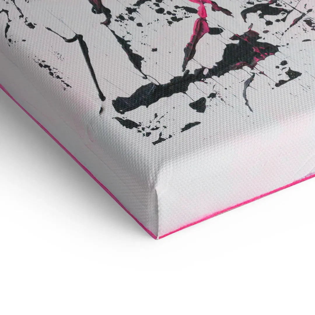 Detailaufnahme eines modernen Leinwandbildes mit schwarzem und pinkem abstraktem Farbdesign