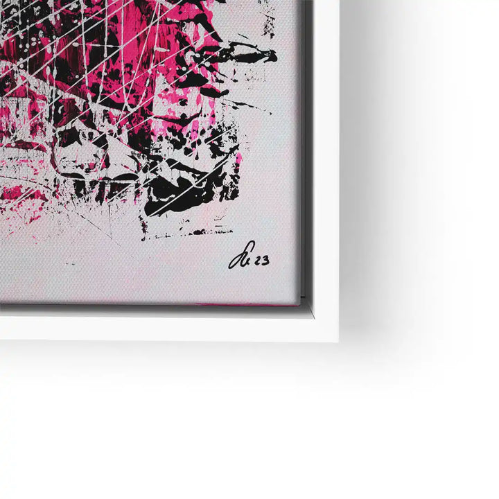 Abstraktes Wandbild in Schwarz, Pink und Weiß mit dynamischen Linien und Farbspritzern im weißen Rahmen