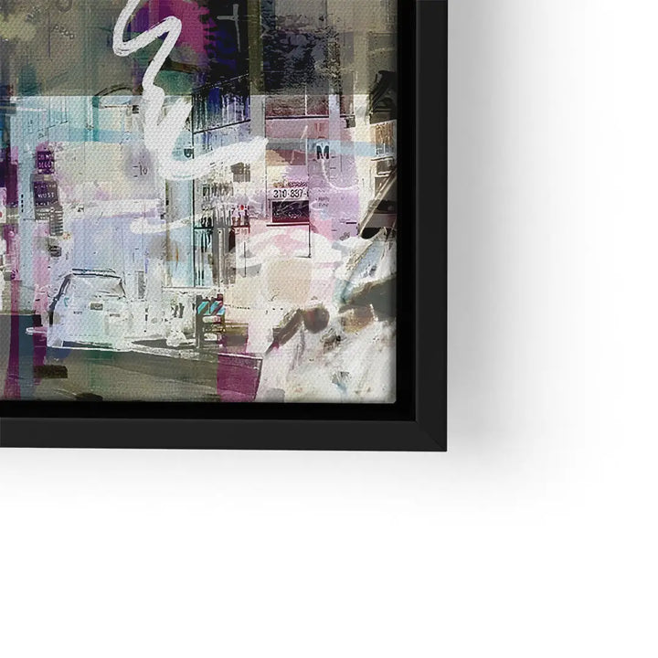 Modernes Wandbild mit abstrakter Los Angeles Stadtansicht und buntem Farbenmix im schwarzen Rahmen.