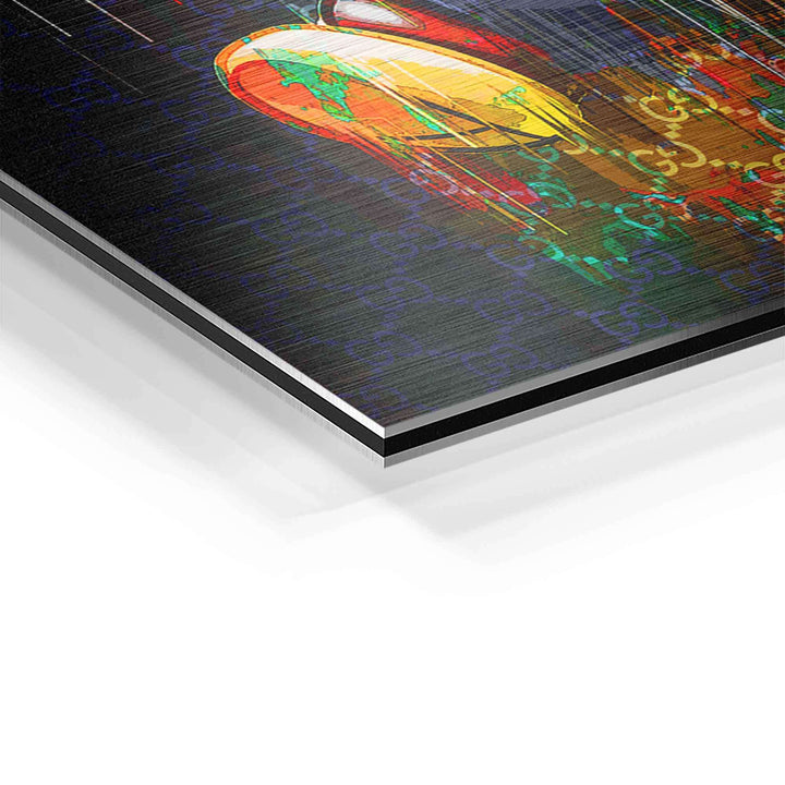 Detailansicht Wandbild mit Comic-Figur, buntem Design und Muster auf gebürstetem Aluminium