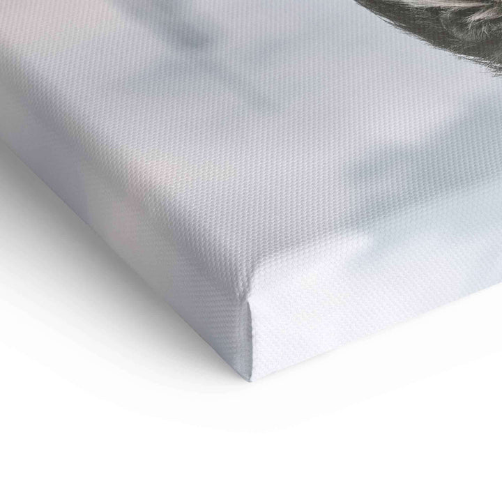 Detail einer bedruckten Leinwand, Nahaufnahme der Struktur und Kante eines Wandbilds