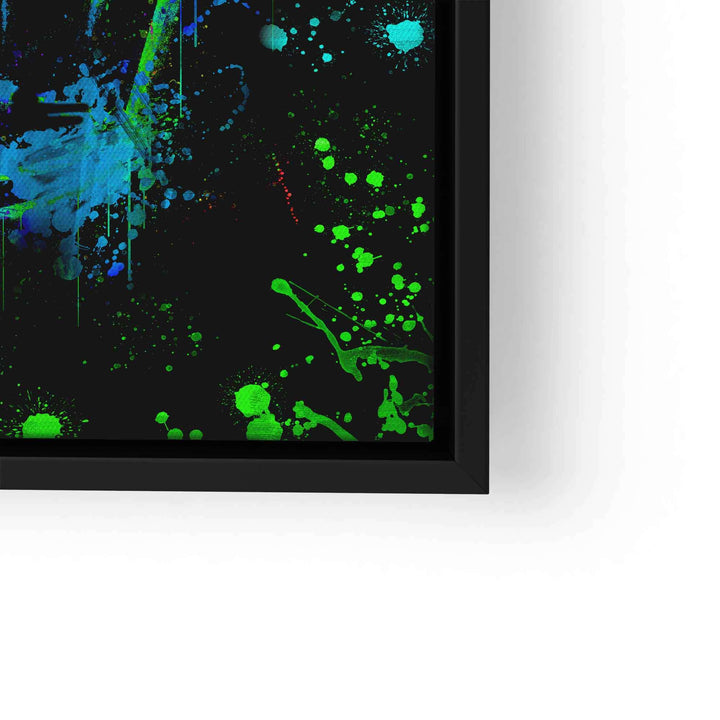Modernes Wandbild mit bunten Farbspritzern in Grün und Blau auf schwarzem Hintergrund