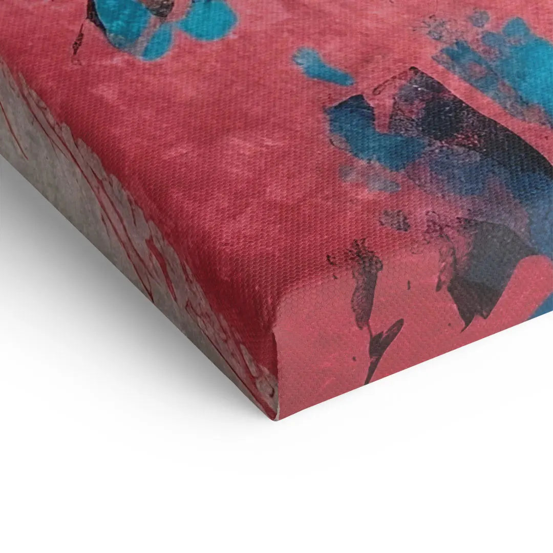 Detailansicht Leinwandbild mit rot-blauen abstrakten Farben auf bespannter Keilrahmenkante