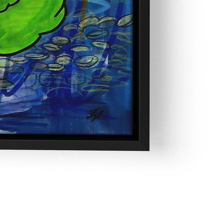 Moderne Wandbild-Kunst mit grünem Element vor blauem, abstraktem Hintergrund im schwarzen Rahmen.