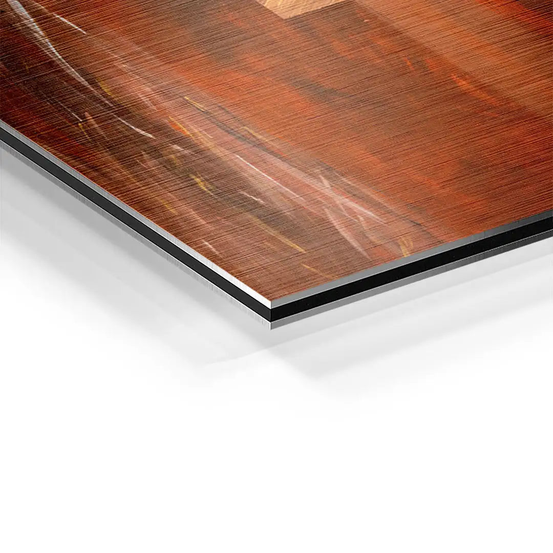 Detailansicht eines Wandbilds mit Puzzle-Motiv auf gebürstetem Aluminium, glänzende Oberfläche