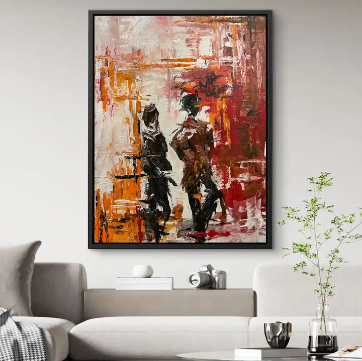 Abstraktes Wandbild mit zwei Personen in Rot- und Orangetönen, modernes Wohnzimmer