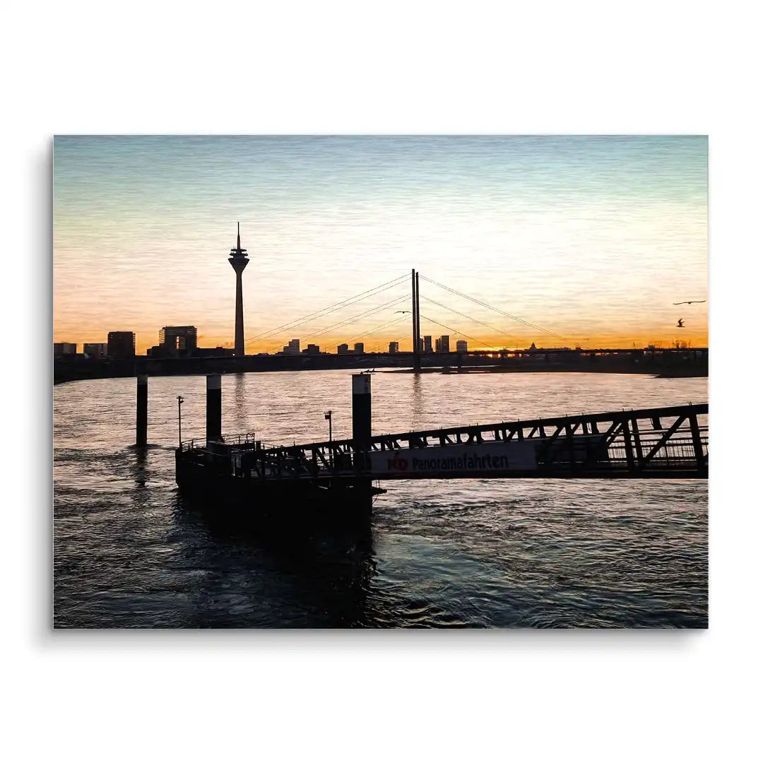 Modernes Wandbild mit Skyline, Brücke und Fluss bei Sonnenuntergang, maritime Kunst
