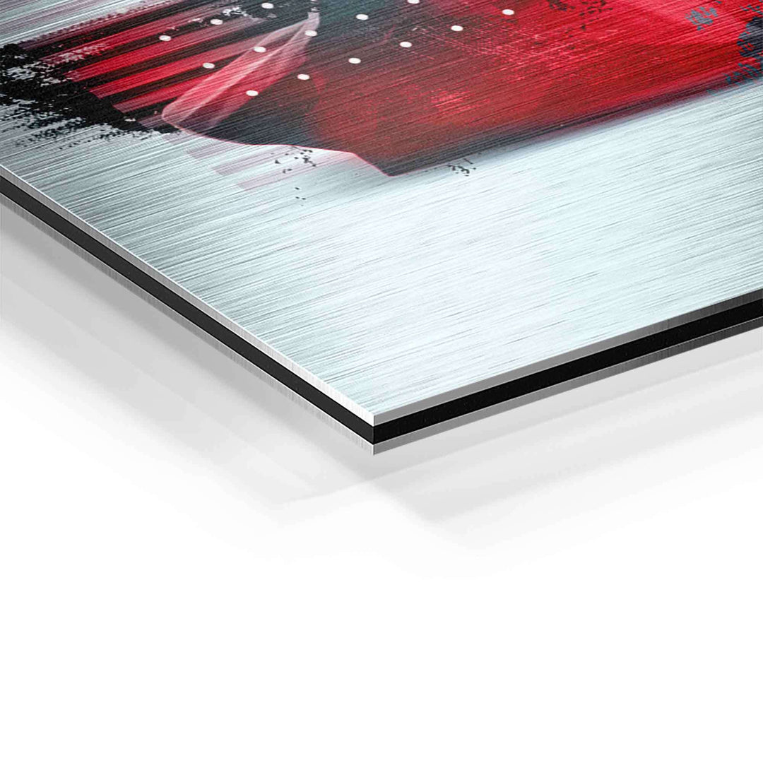 Detailaufnahme einer modernen Wandbild-Skulptur auf gebürstetem Aluminium mit rotem Motiv.